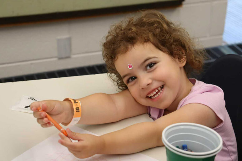 Kids laughing together at top-rated DC summer camps